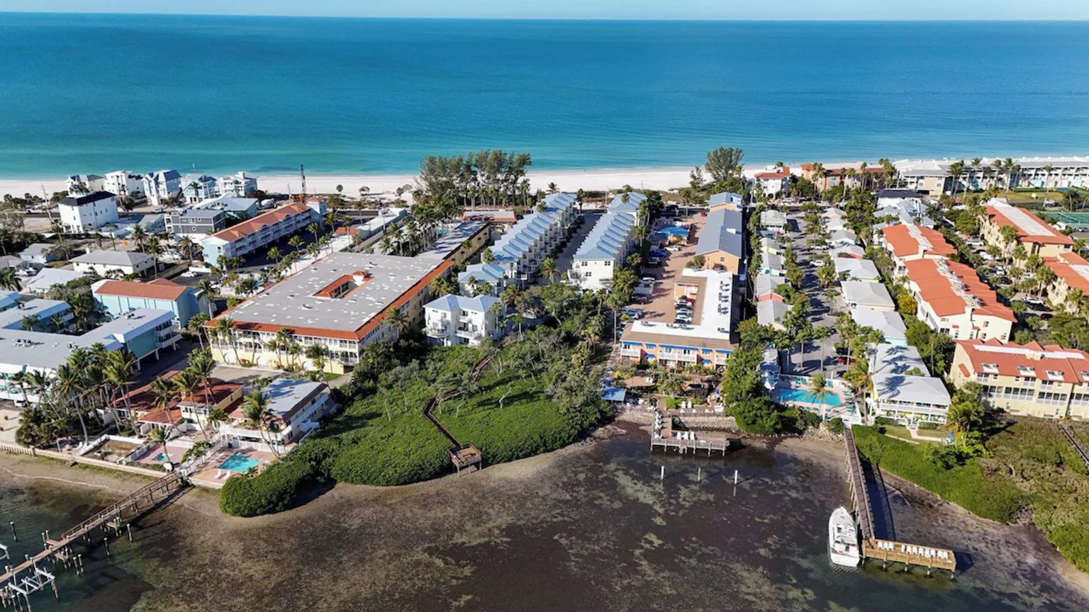 Bayfront Community with Gulf Beach Just Across the Street